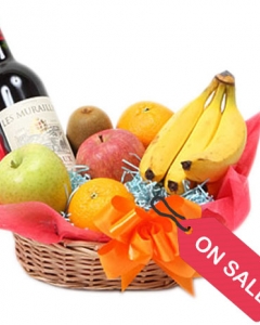 small fruit basket ( 4 items) with sparkling juice
